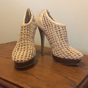 Pale pink braided heels.